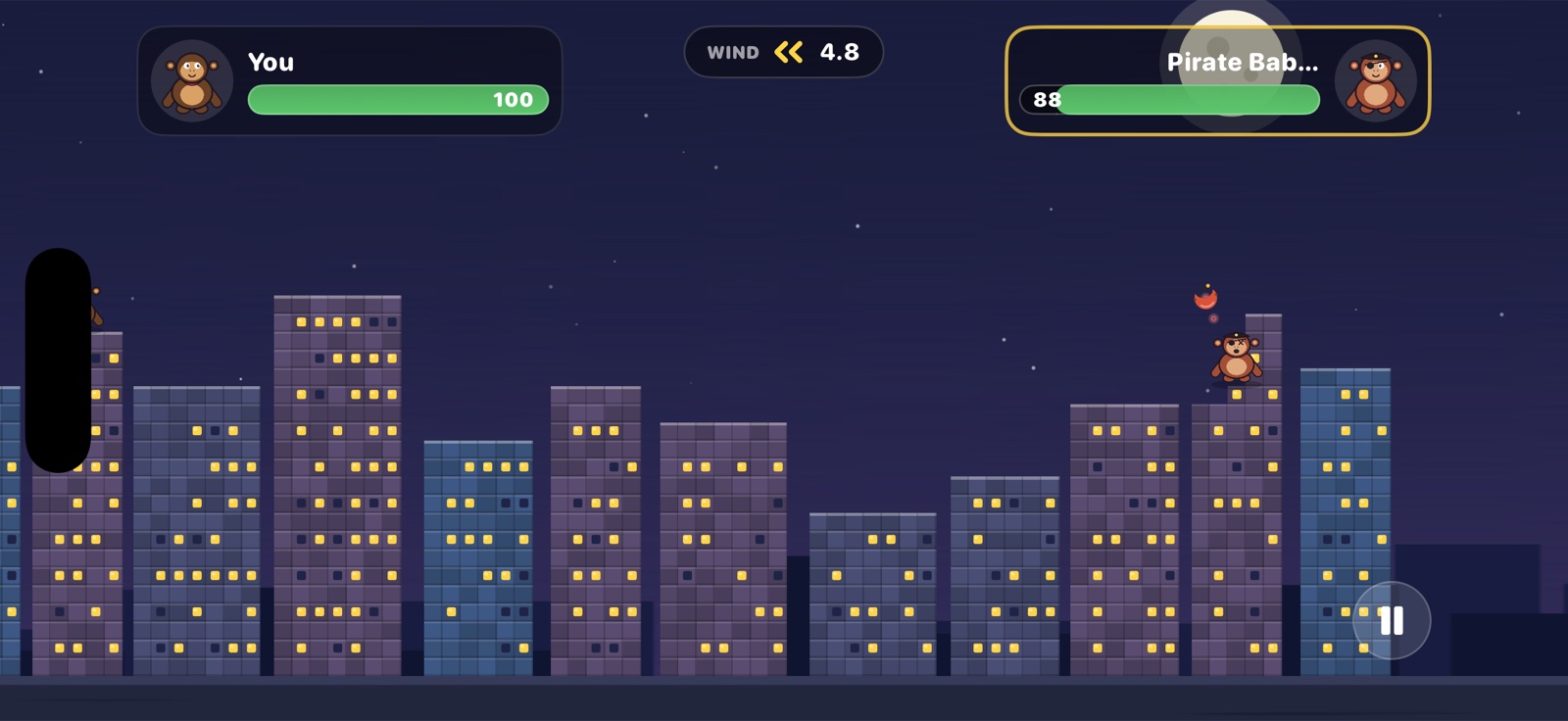 Pirate Baboon winds up a bomb banana atop a lit-up night skyline